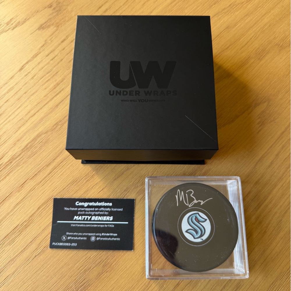 2025 Under Wraps NHL Autographed Puck Signed Matty Beniers Kraken Fanatics